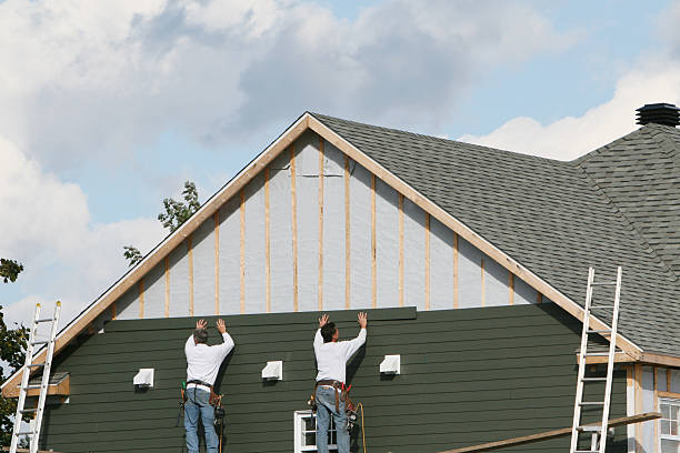 Professional Siding Installation technician working in Madison, VA